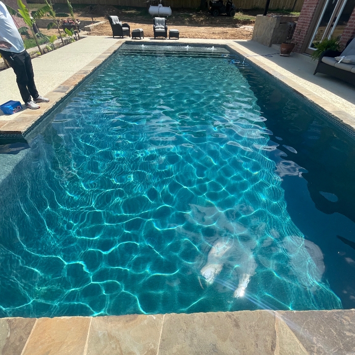 Experienced team providing Pool Service in Briaroaks, TX while performing routine cleaning and equipment maintenance