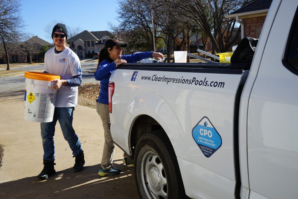 Experienced technicians providing Pool Pump Repair in Mansfield, TX while diagnosing and repairing faulty pool pumps